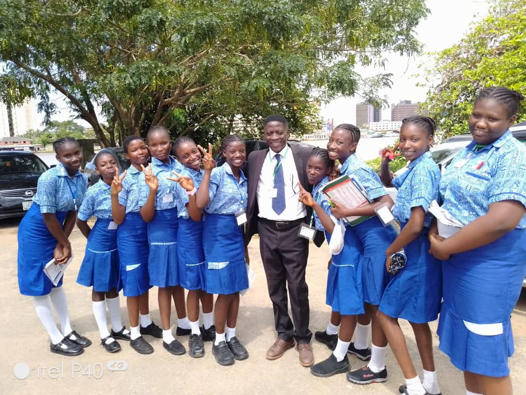 Teacher with students